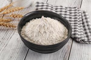Wheat flour heap for bake photo