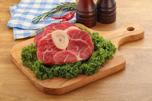 Raw ossobuco beef meat for cooking photo