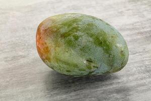 Ripe sweet green tropic mango photo