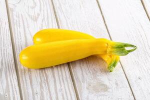 Yellow young zucchini for cooking photo