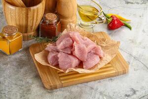 Raw turkey breat fillet cubes photo