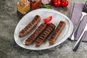 Grilled beef kebab minced meat photo