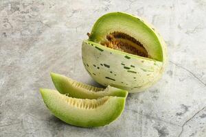 Ripe sweet and juicy dalmatian melon photo