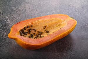 Sweet and juicy tropical papaya photo