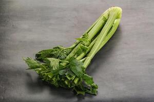 Vegan cuisine - celery stems with leaf photo