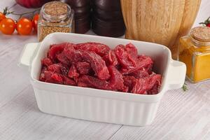 Raw beef meat - sliced strips photo