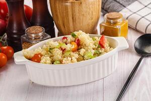 Vegan cuisine couscous with vegetables photo