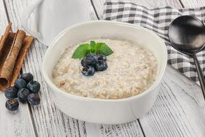 Oats porridge with blueberry photo