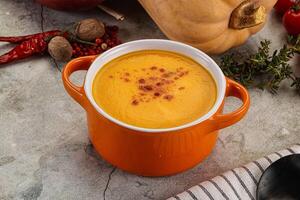 Vegetarian Pumpkin soup with spices photo