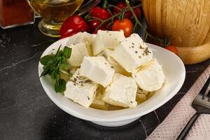 Greek traditional Feta cheese cubes photo