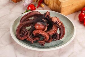 Boiled delicous Octopus in the bowl photo