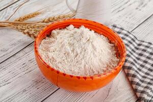 Wheat flour heap for bake photo