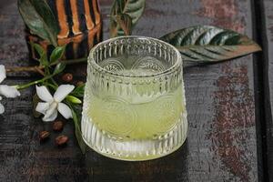 Alcohol limoncello drink in the glass photo