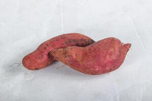 Raw red batat for cooking photo