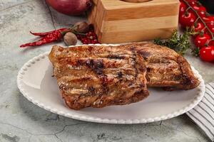 Grilled pork ribs with spices photo