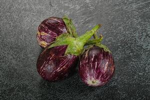 Raw ripe asian small eggplant photo