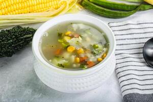 Soup with corn and broccoli photo