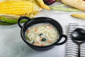 Soup with prawn and noodle photo
