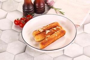 Fried cheese sticks for snack photo