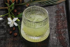 Alcohol limoncello drink in the glass photo