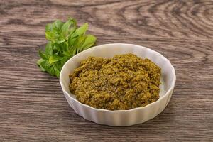 Green sauce pesto with basil photo