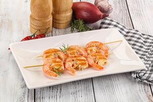 Grilled king prawn skewer snack photo