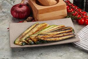 Grilled zucchini with olive oil photo