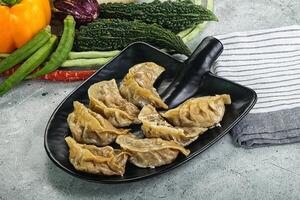 Japanese cuisine - traditional Gyoza dumplings photo