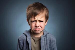 An offended crying little boy. photo