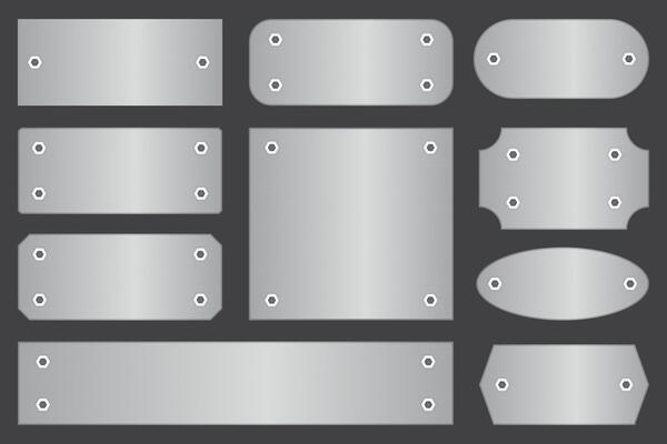 Nameplate with borders and screws. Set of aluminum plates or boards with empty space for sign.
