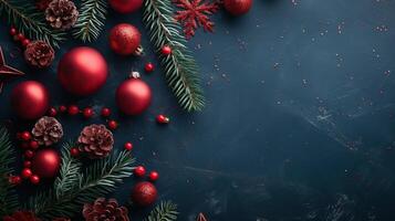 A dark blue Christmas background with red and green decorations photo