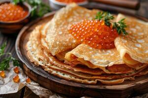 A stack of pancakes with a garnish of berries and a sprig of parsley photo