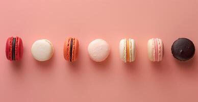 A row of pastries with different colors and flavors photo