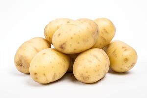 Freshly harvested, raw potatoes piled on a clean white background, ideal for food and agriculture themes photo