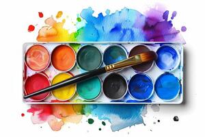 Vibrant watercolor paint palette with brush photo
