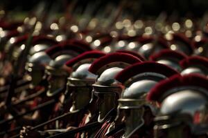 Roman legionnaires helmets in sunlight photo