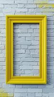 Yellow Frame Against Brick Wall photo