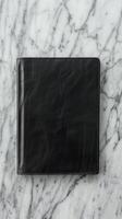 Sleek Leather Notebook On Marble photo