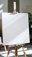 Blank Canvas on Easel in Sunlight photo