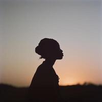 Silhouette Against Sunset Sky photo