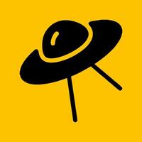 editable ufo icon with yellow background vector