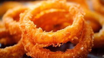 Extreme close-up of fried onion rings. Food photography photo