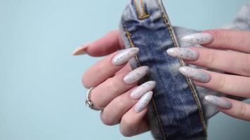 Female hands with blue nail design. Blue nail polish manicure. video