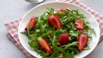 Vitamin salad of strawberry with arugula video