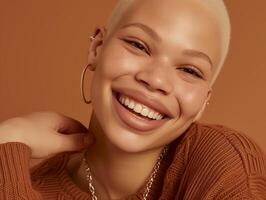 Portrait of a young woman with a bald head, smiling warmly in brown sweater. Cosmetic advertisement photo