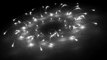 Looping animation of neon glowing lines moving in space. Looped movement. Close-up video