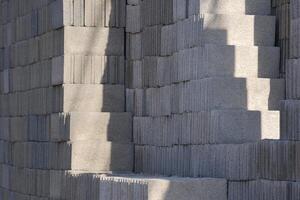 Stack of concrete blocks inside of construction site photo