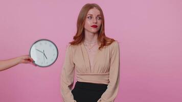 Confused woman with anxiety checking time on clock, running late to work, being in delay, deadline video