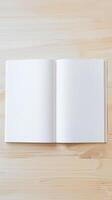 Blank Open Book On Wooden Surface photo