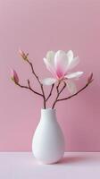 Magnolia Bloom In White Vase photo